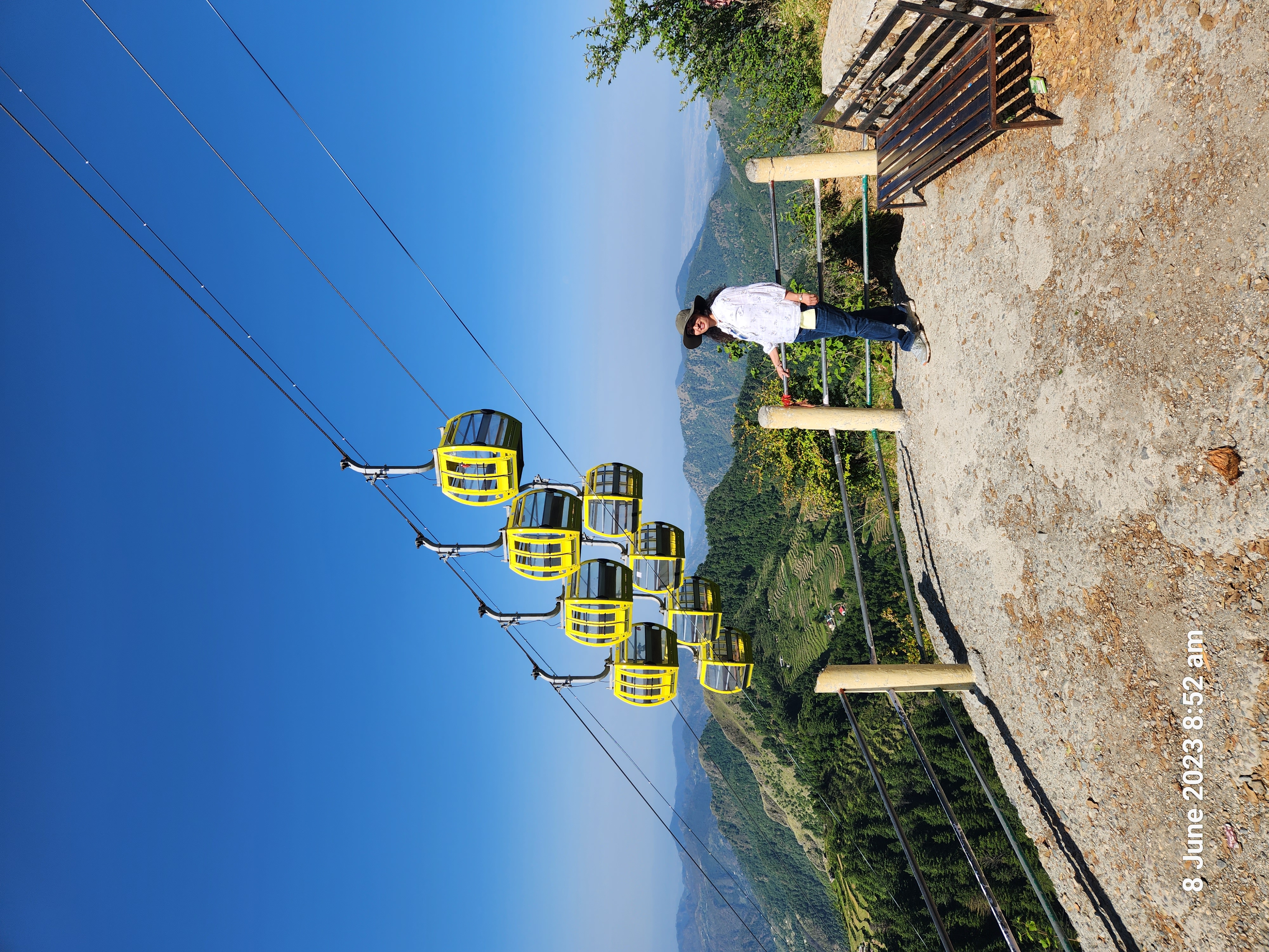 Mangat Farms guest enjoying a mountain ropeway viewpoint